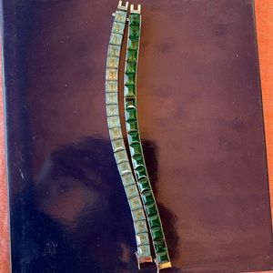 Pair of Art Deco aquamarine and emerald paste sterling silver line bracelets